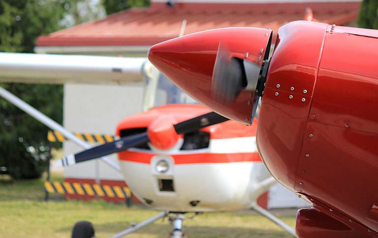 red and white airplanes close up